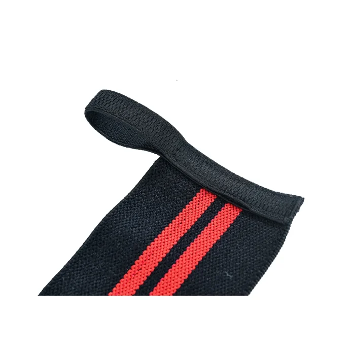 detailed view of wrist wraps for weightlifting in red