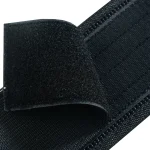 detailed view of quick release weightlifting belt made of durable black nylon